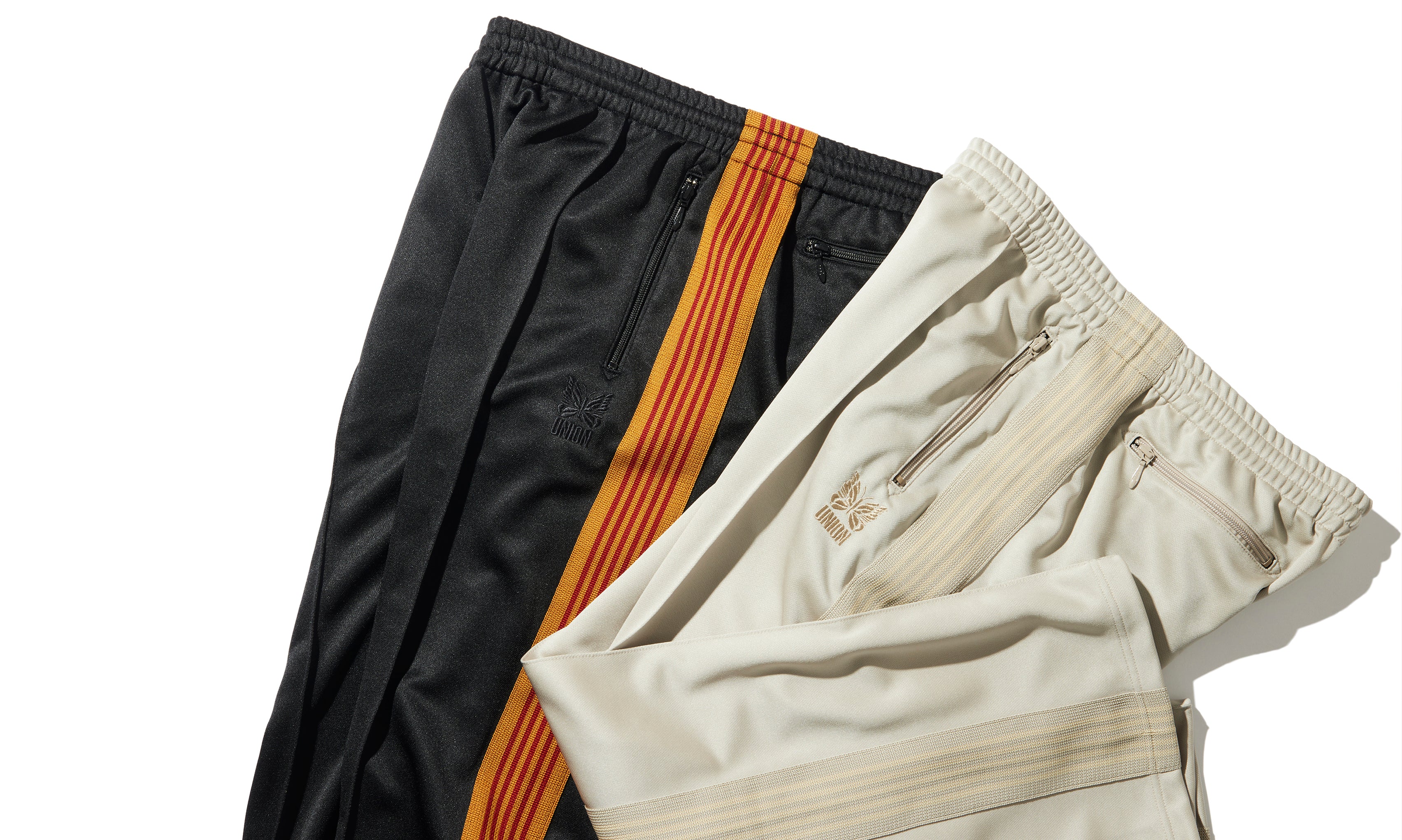 union × needles track pants beige Sその他 - northwoodsbookkeeping.com