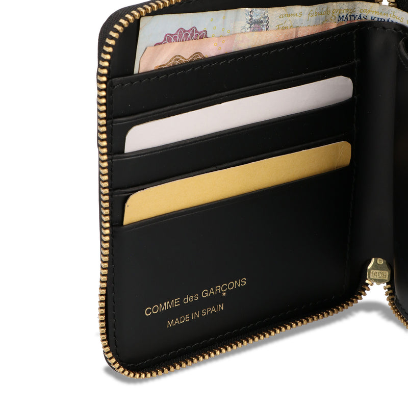COMME des GARCONS WALLETS(コムデギャルソンウォレッツ)｜BIG BOW LEATHER ROUND ZIP WALLET(ビッグボウレザーラウンドジップウォレット)｜【公式通販 UNION TOKYO】｜ユニオントーキョー